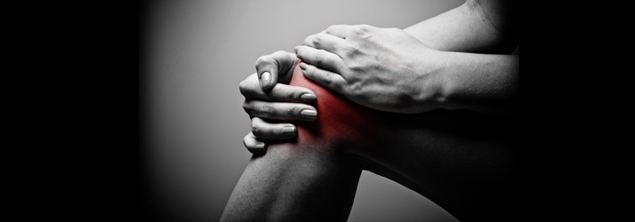 Chiropractic Burlington MA Red Knee Pain Hands On Knee